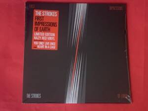 THE STROKES " FIRST IMPRESSIONS OF EARTH " 1 LP. ED. LIMITADA. VINILO DE COLOR